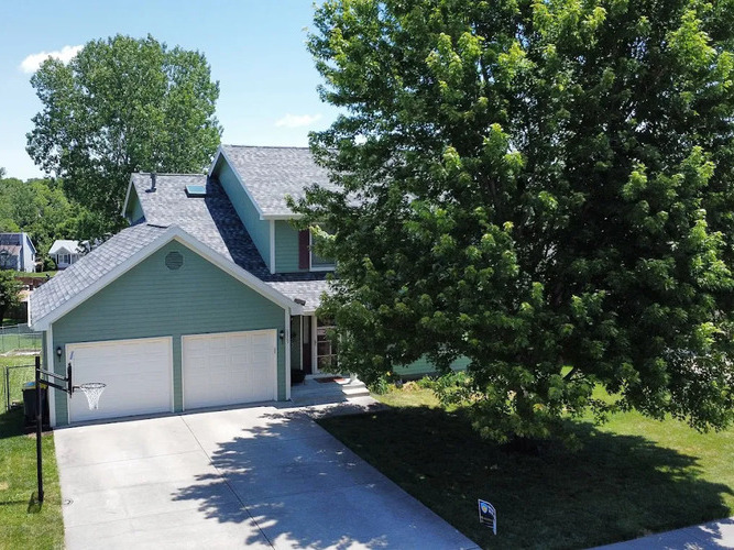 home with a synthetic shingle roof